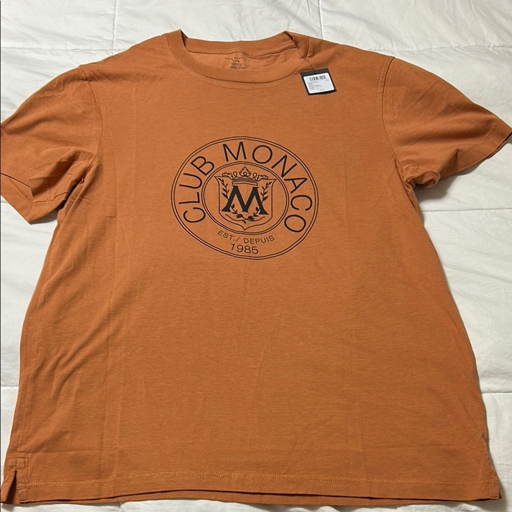 Club Monaco Orange Short Sleeve Tee with Emblem size large. NWT